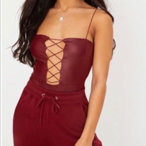 Burgundy scrappy lace up thong bodysuit
